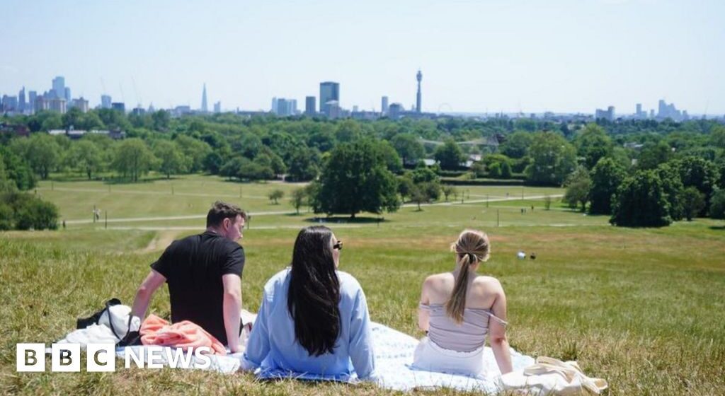 UK Weather: Hottest day of the year as storms rage north

